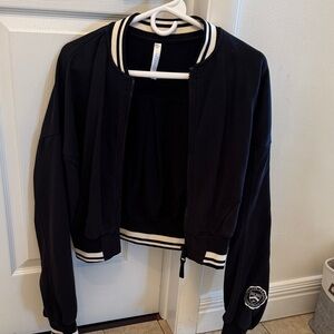 Fabletics cropped Black Varsity Jacket with White Accents